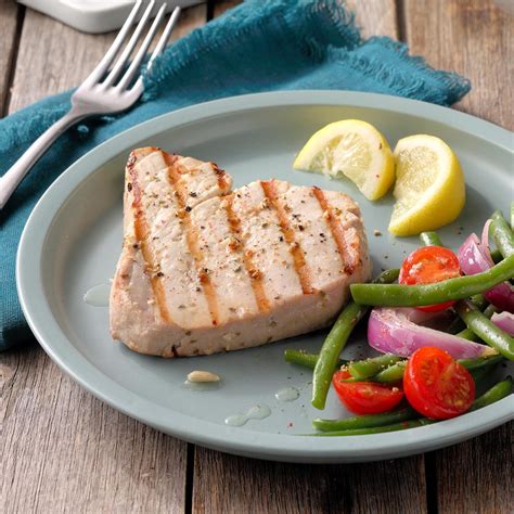 Set cooking grate in place, cover grill, and allow to preheat for 5 minutes. Clean and oil grilling grate . Dry tuna steaks well with paper towels and lightly brush …